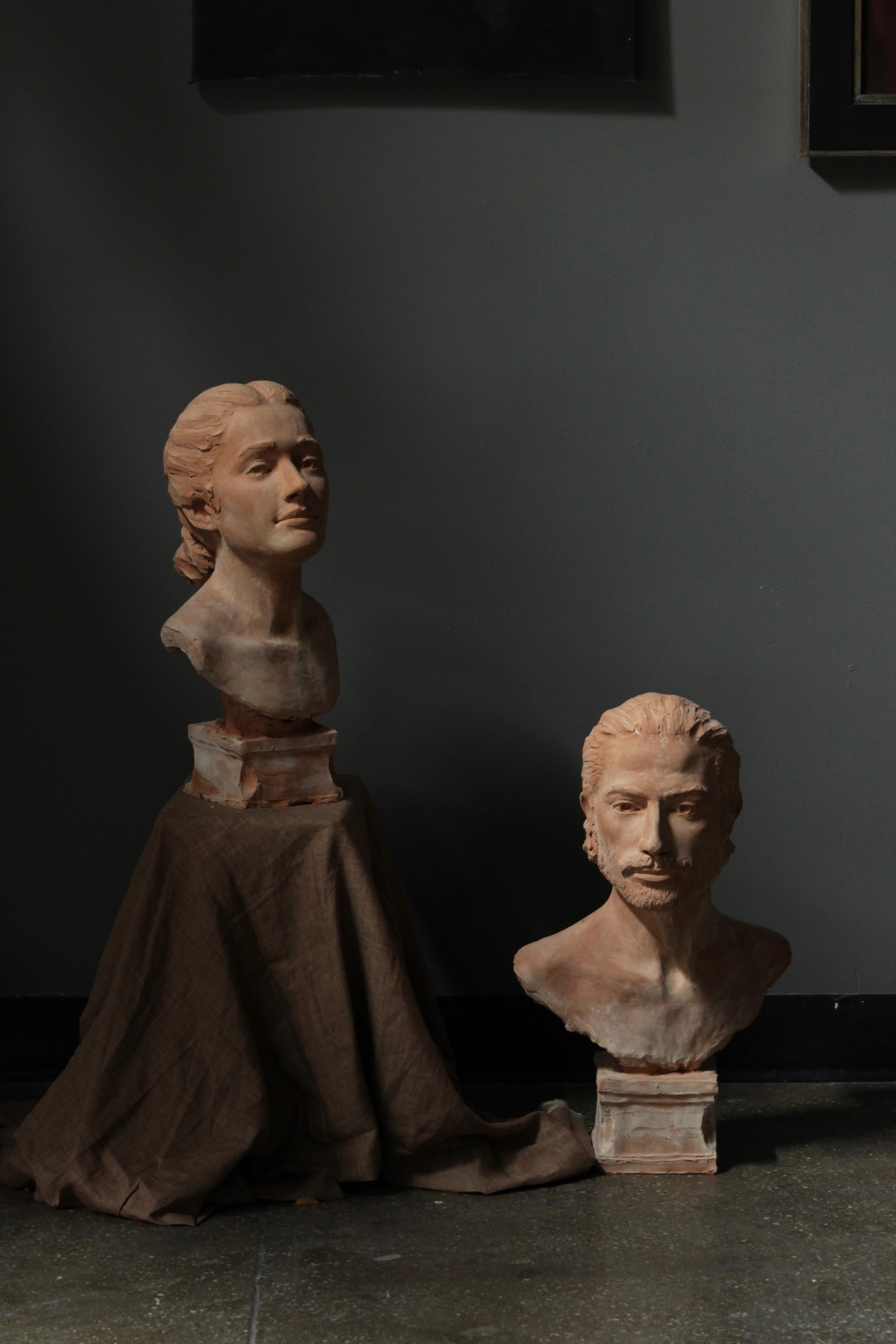 Scultura di testa maschile in terracotta 