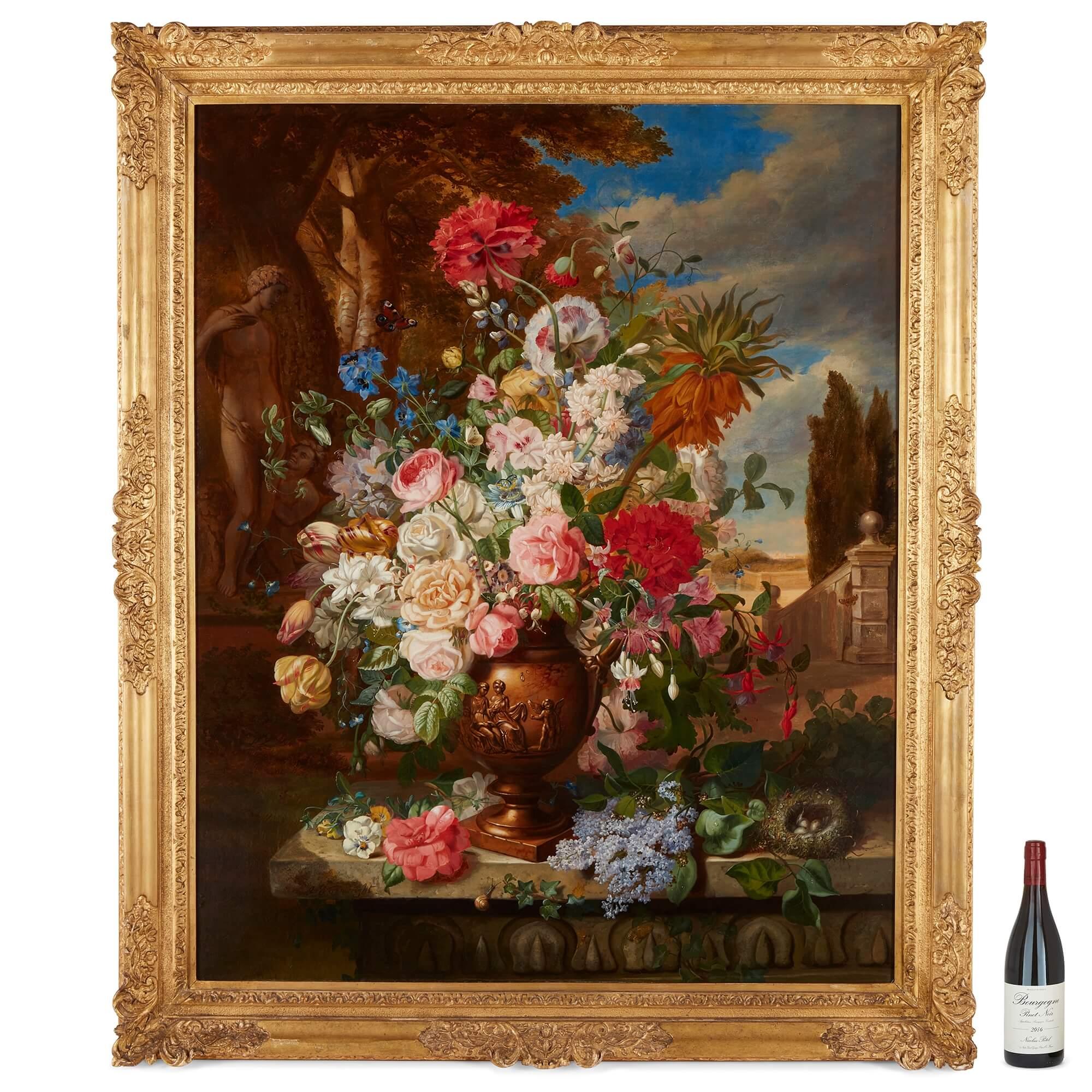 Antique still life of flowers by W. J. Wainwright 
English, Late 19th Century 
Canvas: Height 127cm, width 101cm
Frame: Height 144cm, width 120cm, depth 7cm

This beautiful still life in oils depicts an overflowing vase of flowers against a