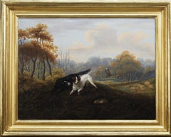 Antique Two spaniels working with a huntsman beyond