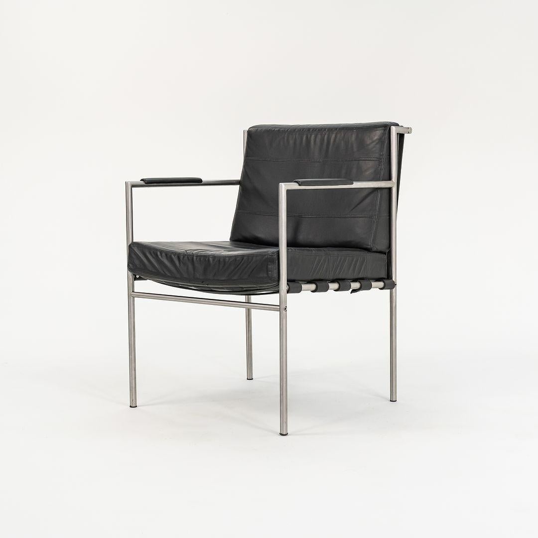 This is a developmental prototype arm chair in Brushed Steel and Black Leather, designed by Bill or Wililam Katavolos and produced by Gratz Industries in 2009. This example came from the private collection of Gratz Industries and is a rare an