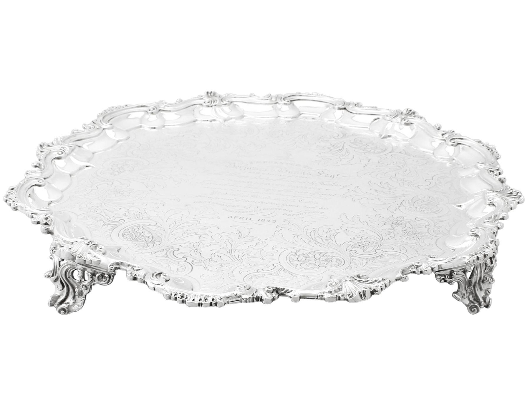 A magnificent, fine, large and impressive antique early Victorian English sterling silver salver by William Ker Reid; part of our antique salver collection.

This magnificent antique Victorian sterling silver salver has a circular shaped form onto