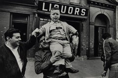 Dwarf and Liquors, Little Italy, NYC, black + white photograph by William Klein