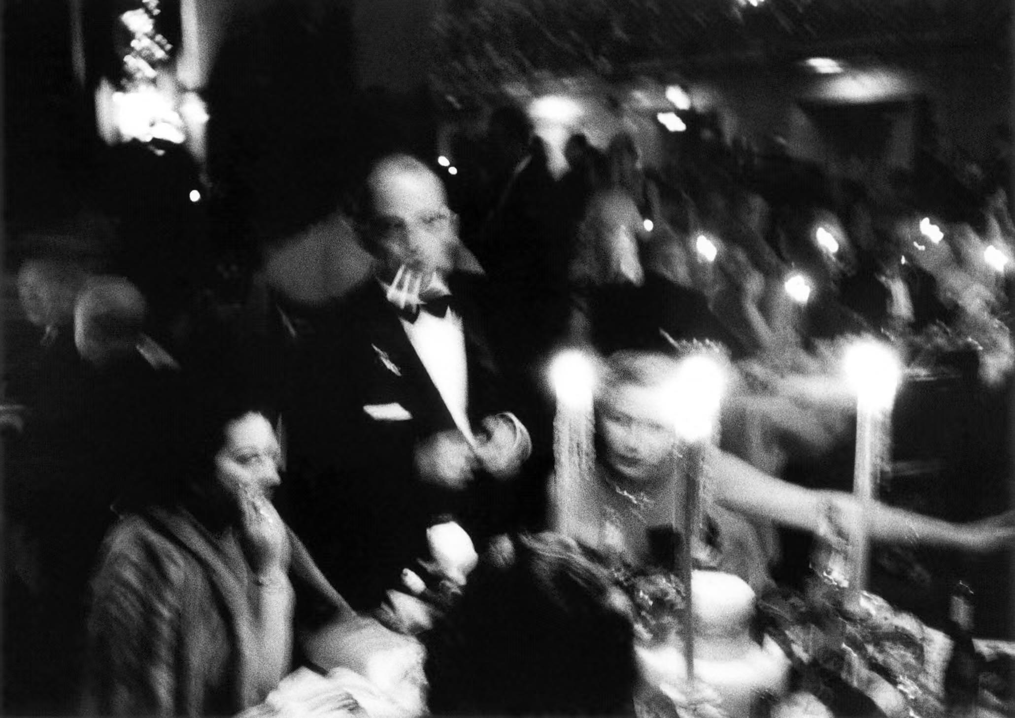 William Klein Black and White Photograph - Elsa Maxwell
s Toy Ball at the Waldorf, New York (3 Cigarettes), 1955