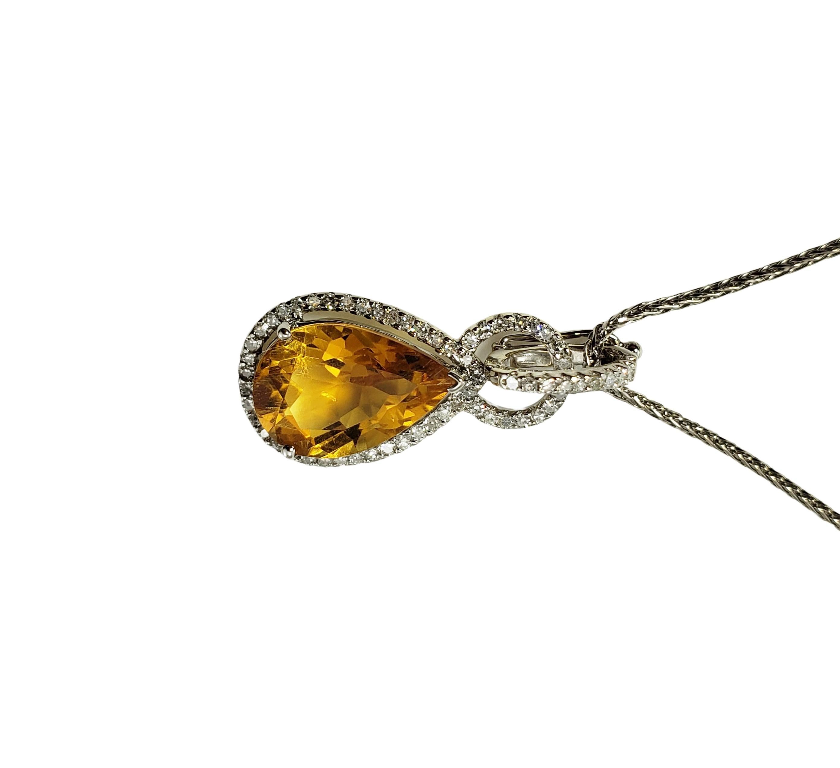William Lam & Co. 14 Karat Yellow Gold Citrine and Diamond Pendant Necklace-

This lovely pendant necklace features one pear shaped citrine (13 mm x 8 mm) surrounded by 59 round single cut diamonds set in classic 14K white gold.  

Approximate total