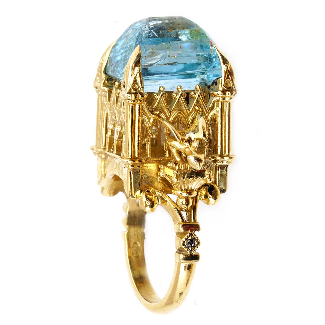The Almighty Empress Ring is a luminous, baroque dream. This stunning piece is one of a kind and fits a size 6 1/2 (Australian & British size N).

Handcrafted in 18kt yellow gold the ring features a vibrant, 14.3mm x 11.5mm aquamarine. The addition