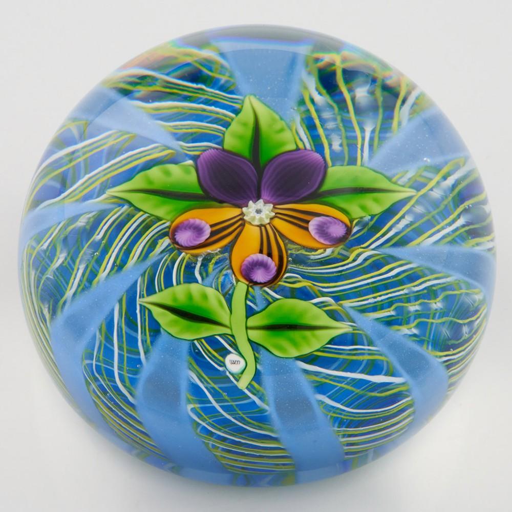 Heading : A William Manson Lampwork and MIllefiori Pansy Paperweight c1990
Date : c1990
Origin : Scotland
Features : A fabulous lampwork and millefiori pansy flower on a latticinio blue and yellow radial spoke base
Marks : A WM signature cane to the