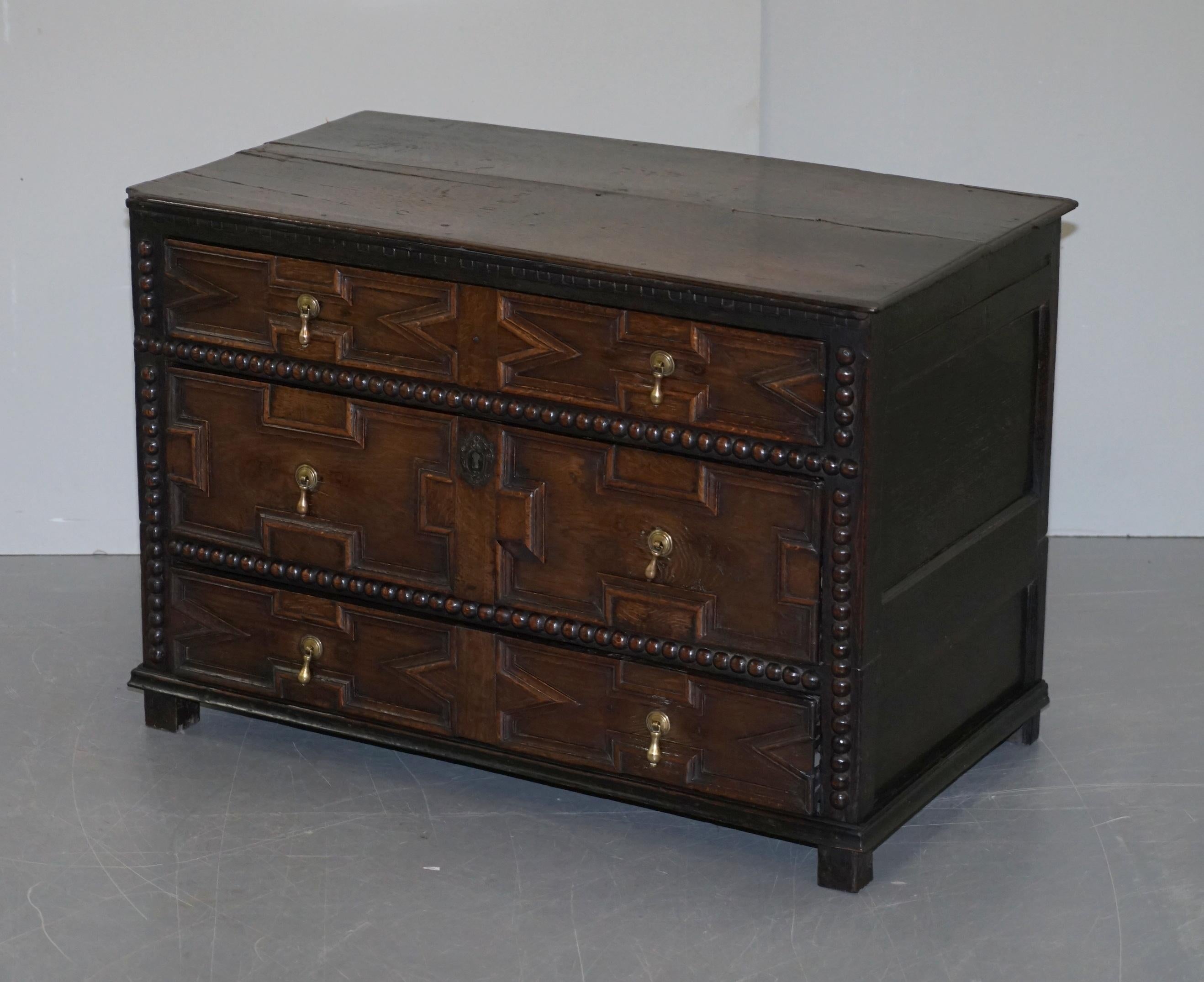 We are delighted to offer for sale this lovely original circa 1680 William & Mary English oak low chest of drawers

A rare survivor, these drawers are circa 340+ years old, hand carved from solid oak, these were naturally made to last and made to