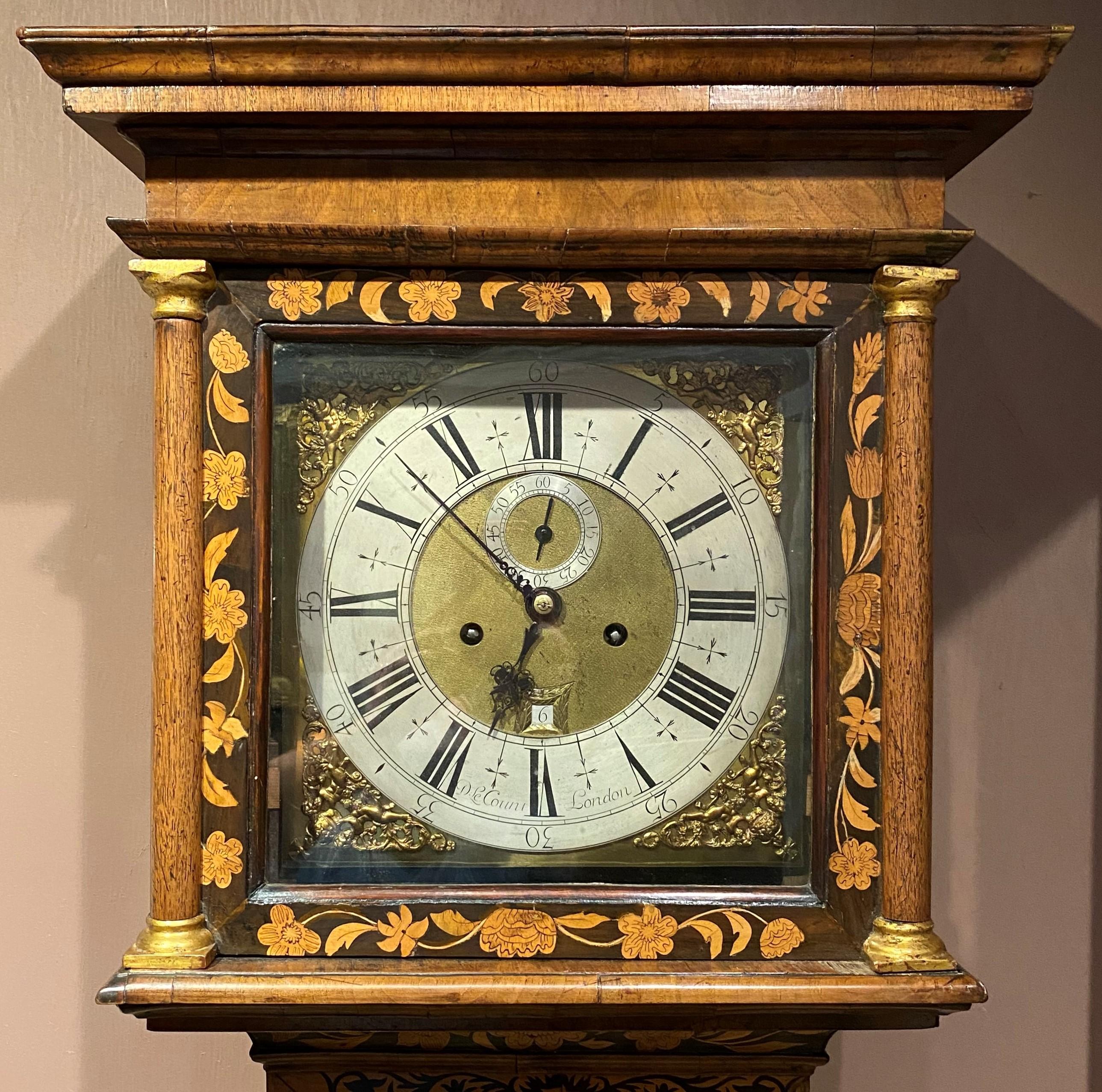 A fine and rare William & Mary long case or grandfather clock by London maker Daniel LeCompte. c.1690, London, the fine marquetry case having oval panels of birds and flowers, the movement signed Daniel LeCount (LeCompte) having a silver chapter