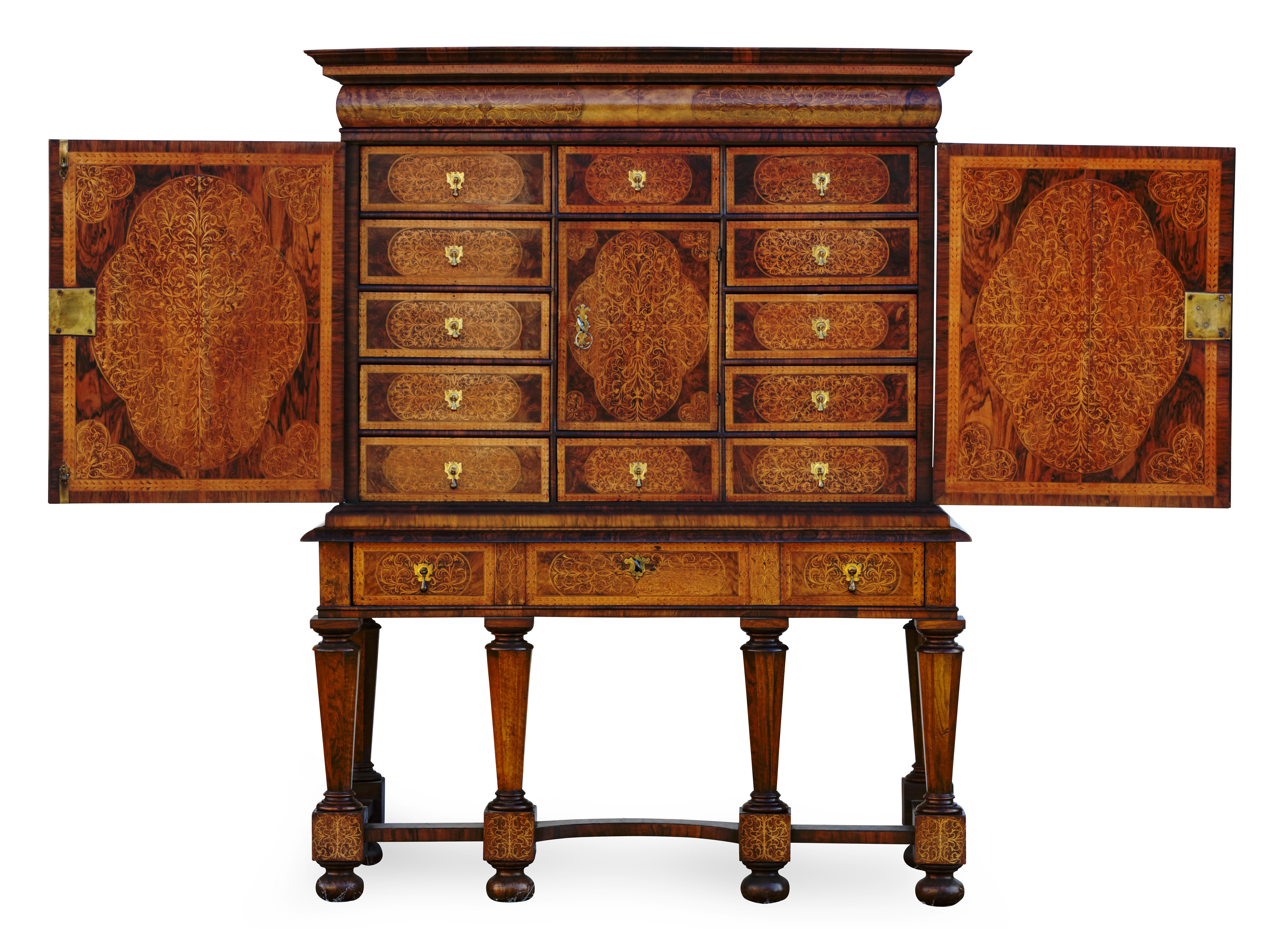 An Anglo-Dutch William and Mary Seaweed Marquetry cabinet on stand by Gerrit Jensen, Royal Cabinetmaker
England, circa 1690

The cabinet is completely covered with so called Seaweed marquetry and it is of the finest, most splendid quality! The