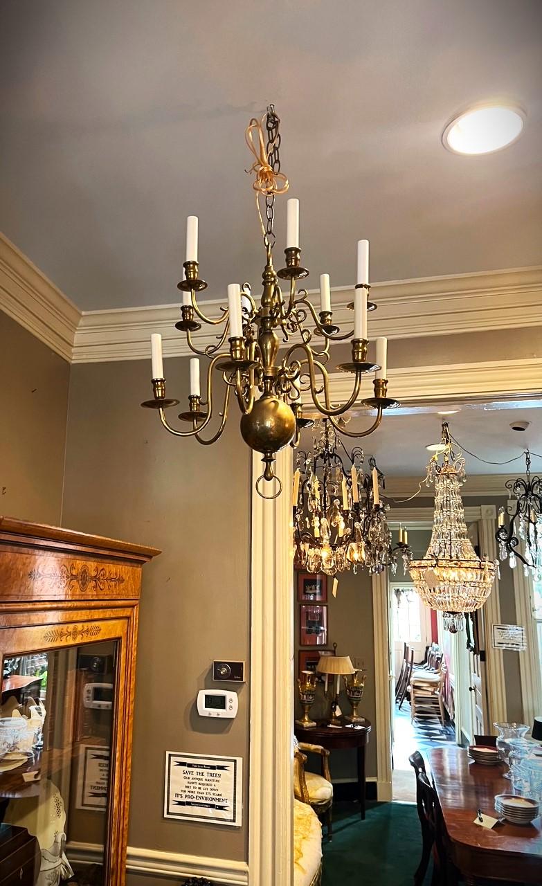 This Anglo-Dutch  chandelier is a faithful copy of the Jacobean designs poplar in the 17th & early 18th Century in the Low Countries, Great Britain, and Colonial America. Its 2-tiers with 12 lights give it a real presence perfect for over a large