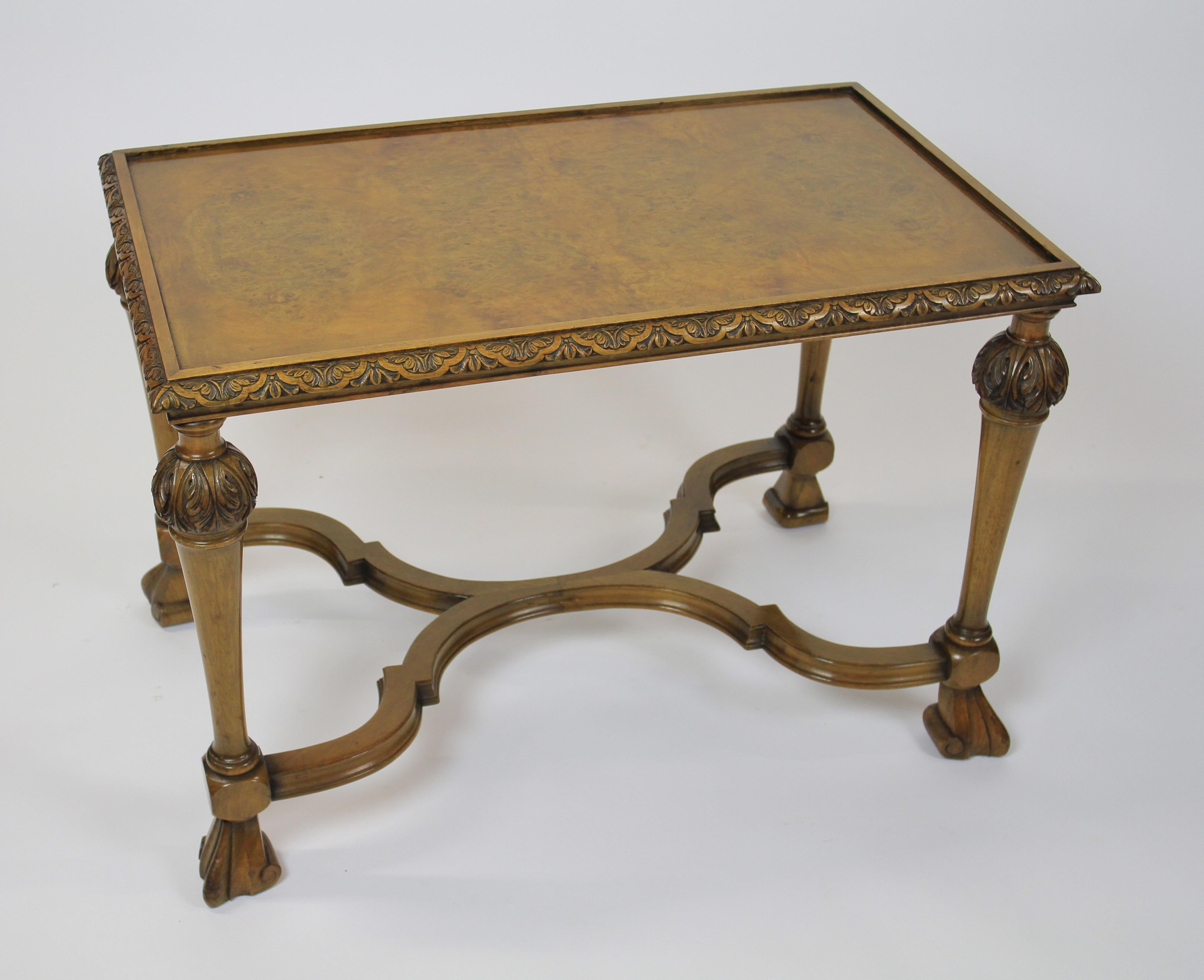 William & Mary Style Burr Walnut & Carved Coffee Table circa 1930s
Inset Burr Walnut Top
 With Carved Detail Around top edge,
4 carved & turned legs with Knurl shaped feet
Shaped Walnut Cross Stretcher
Recently Polished
Good quality table