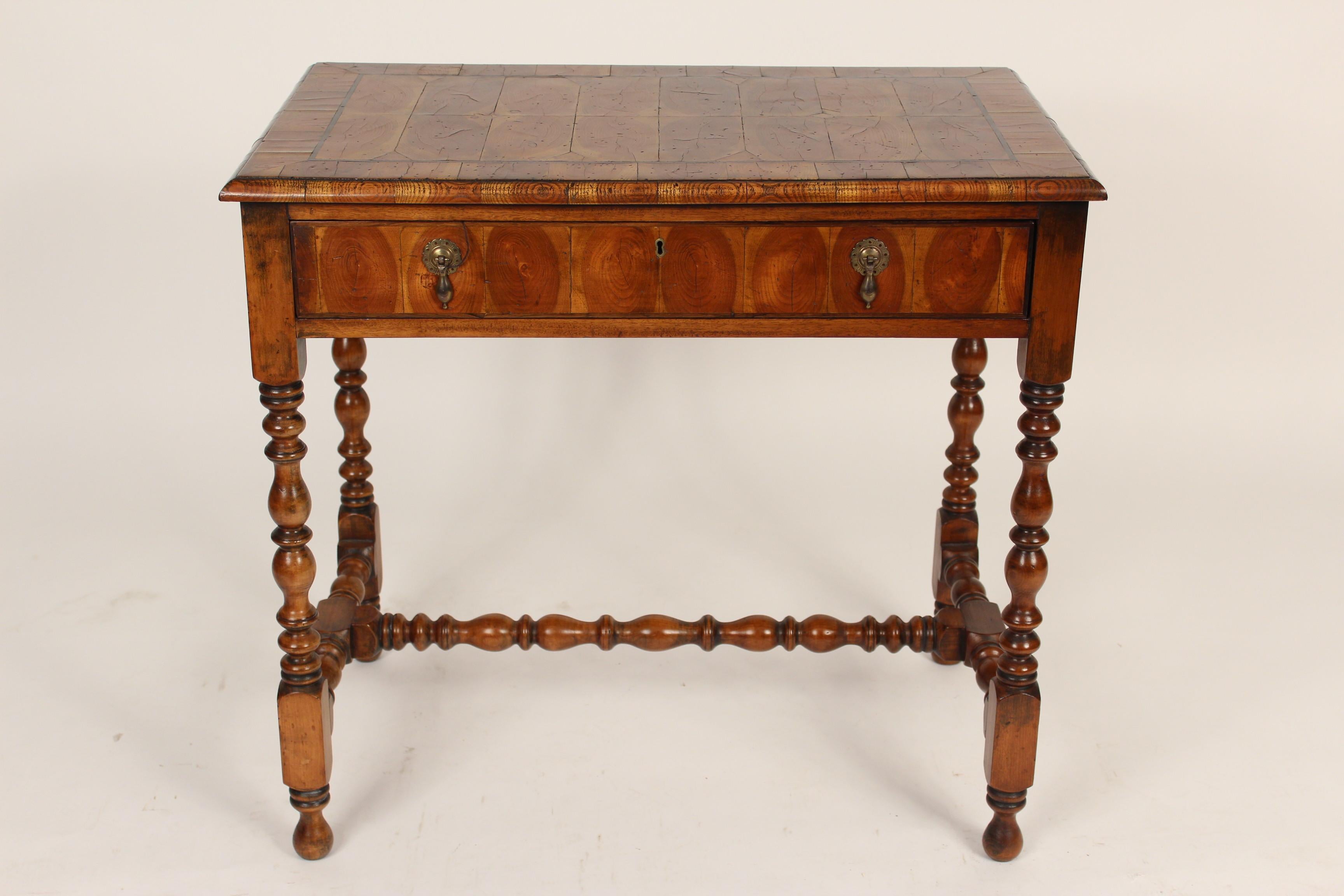 William & Mary style oyster burl and walnut occasional / writing table, approximately 60 years old. With turned legs, stretcher bar and excellent color oyster burl top, front and sides.