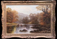 Precioso paisaje fluvial otoñal de estilo victoriano: ganado bebiendo bajo los árboles del bosque