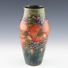 William Moorcroft Green Ground Pomegranate Vase Marked for Liberty & Co., c1913