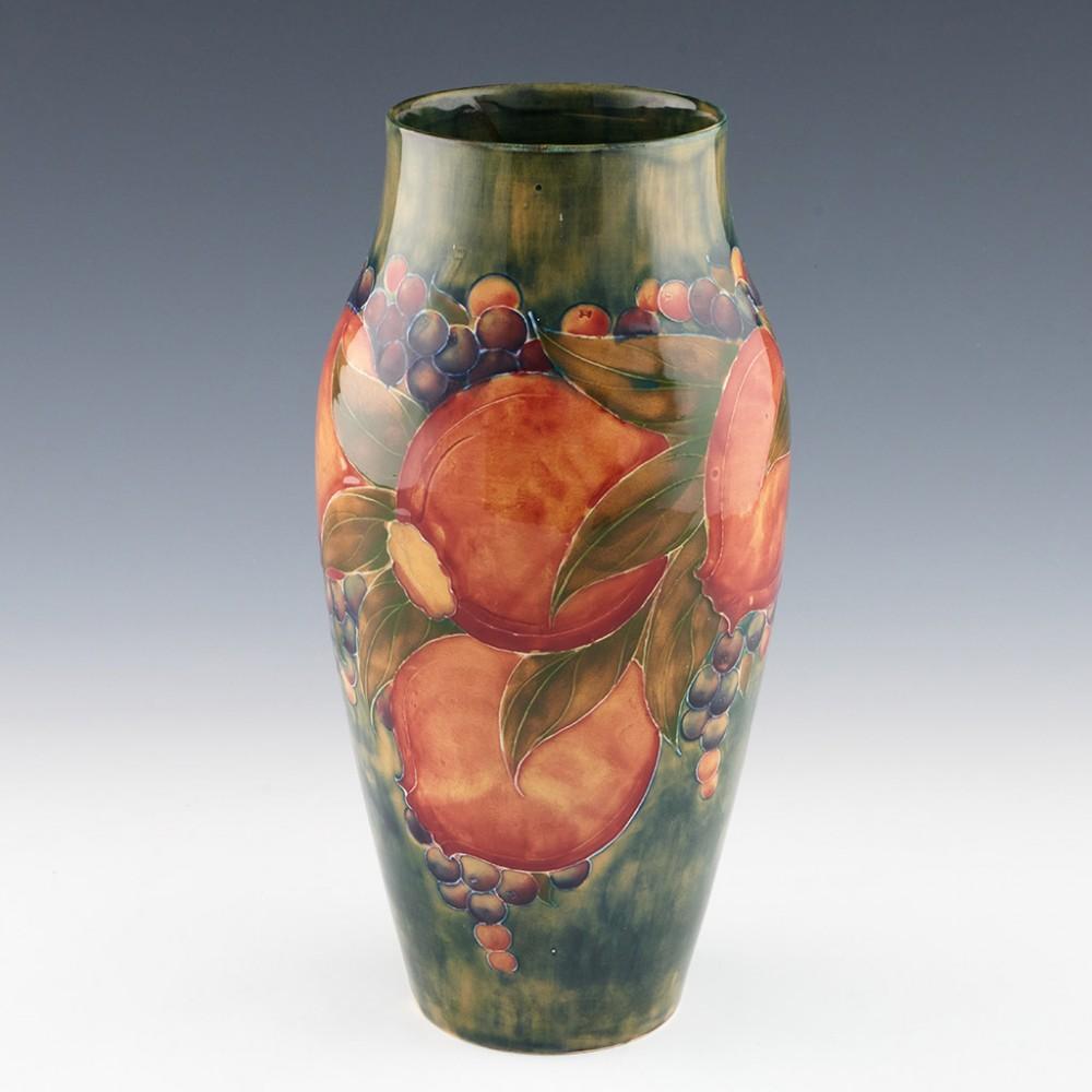 English William Moorcroft Green Ground Pomegranate Vase Marked for Liberty & Co., c1913