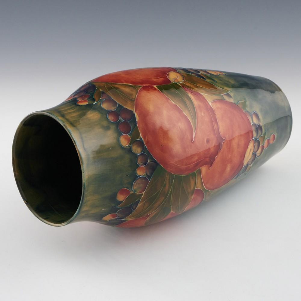 William Moorcroft Green Ground Pomegranate Vase Marked for Liberty & Co., c1913 In Good Condition In Tunbridge Wells, GB