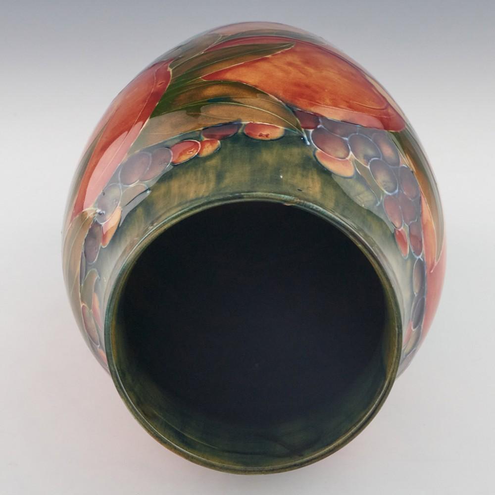 Pottery William Moorcroft Green Ground Pomegranate Vase Marked for Liberty & Co., c1913