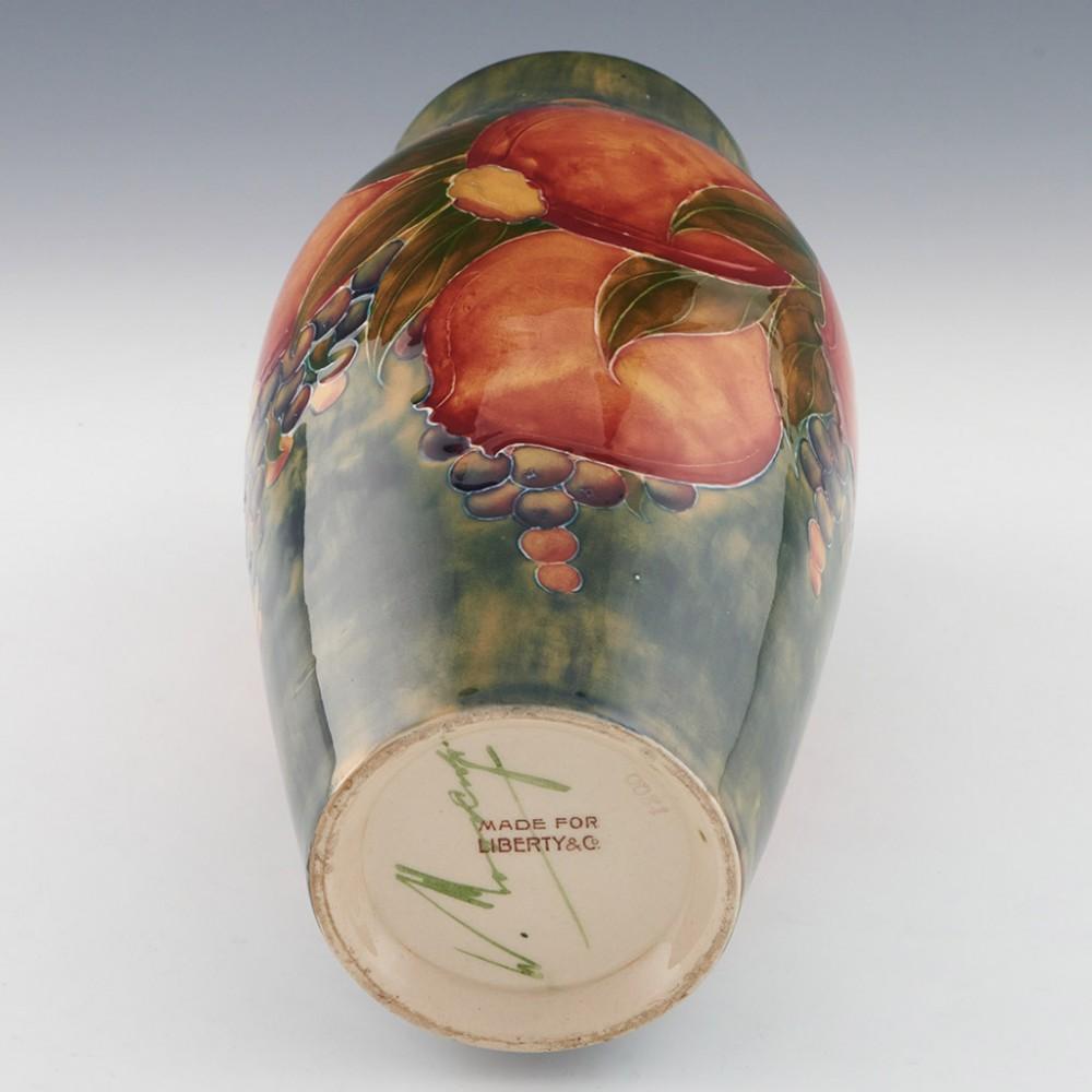 William Moorcroft Green Ground Pomegranate Vase Marked for Liberty & Co., c1913 1