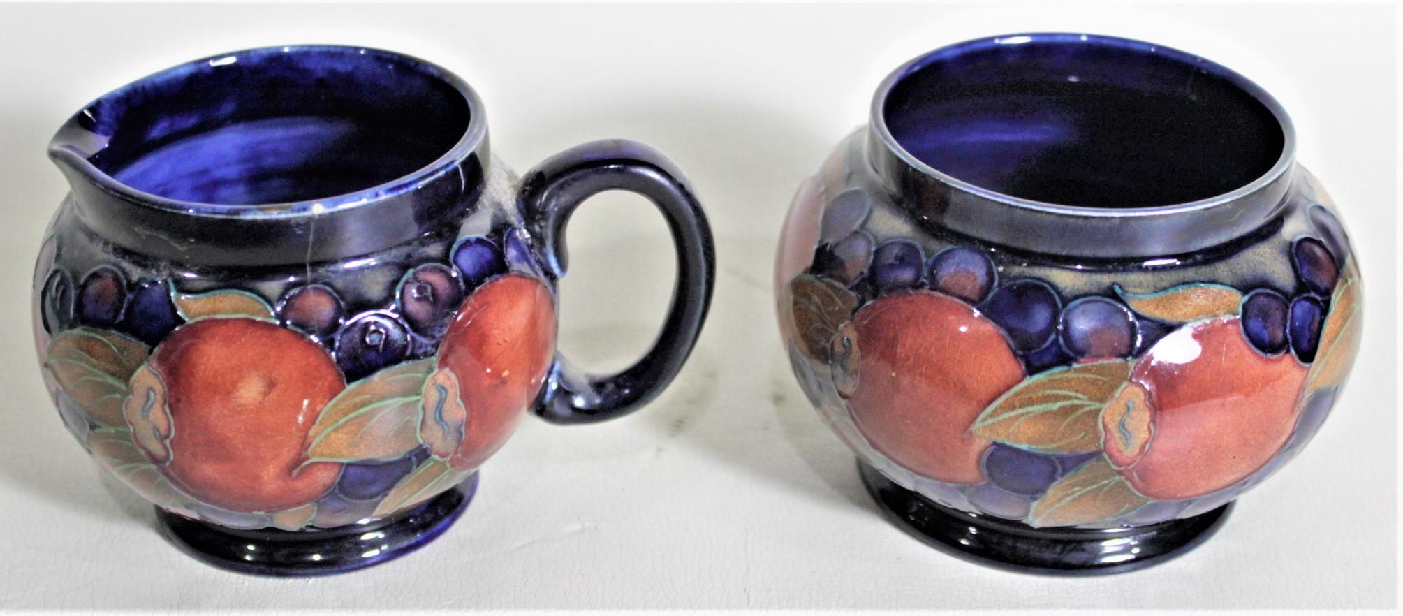English William Moorcroft Pomegranate Patterned Art Pottery Creamer and Sugar Bowl Set
