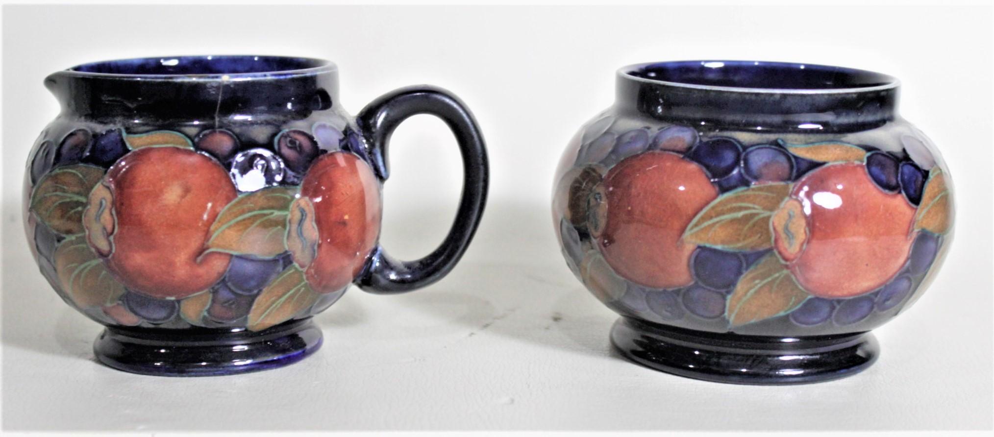 Hand-Crafted William Moorcroft Pomegranate Patterned Art Pottery Creamer and Sugar Bowl Set