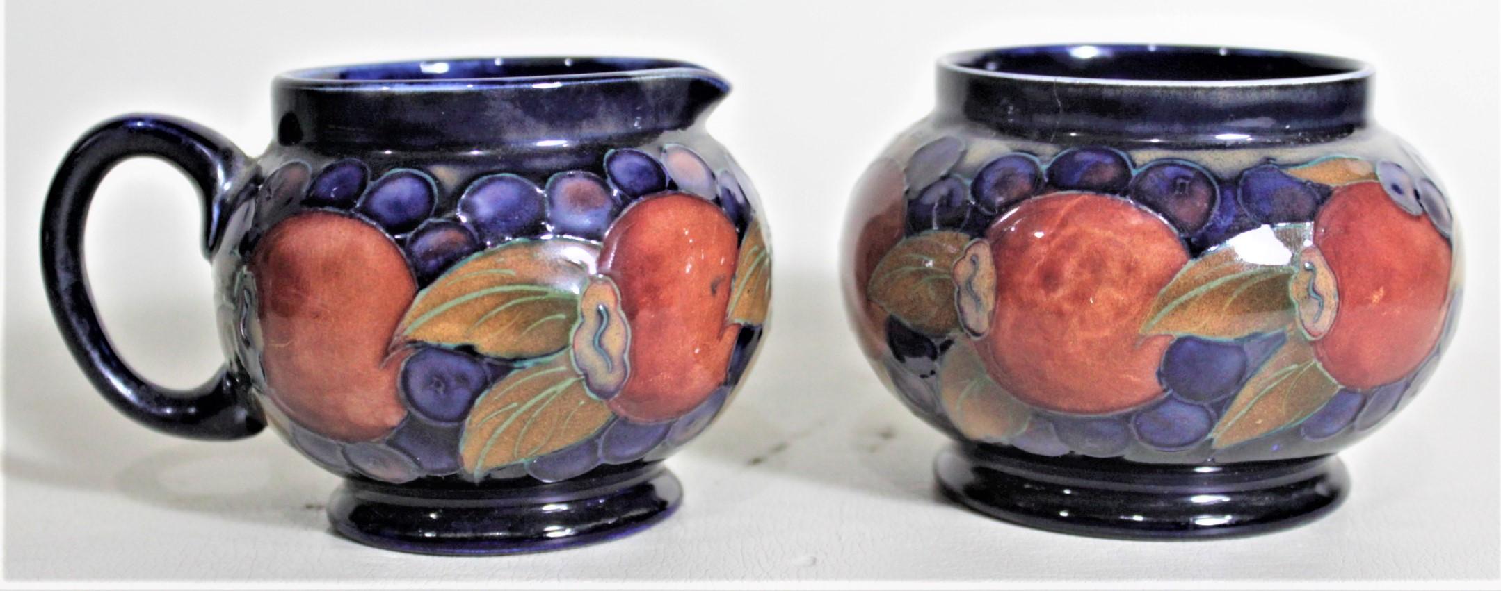 20th Century William Moorcroft Pomegranate Patterned Art Pottery Creamer and Sugar Bowl Set