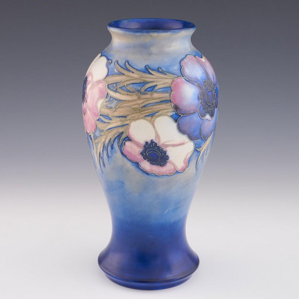 William Moorcroft Salt Glaze Anemone Vase, circa 1938

Additional Information:
Date: 1935-40
Origin: Burslem, England
Bowl Features: Baluster form with blue ground and pink, white, and green anemone decoration
Marks: Made in England impressed