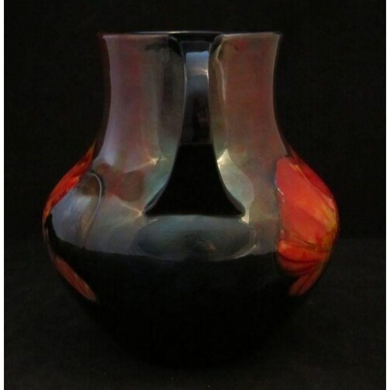 William Moorcroft two handled vase decorated in the Claremont design in a good flambe glaze, Circa 1930s

Dimensions: 20cm high, 17cm wide

Complimentary Insured Postage
14 Day Money Back Guarantee
BADA Member – Buy the Best from the Best.