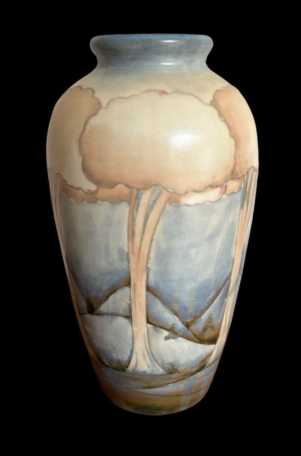 5363
Exceptional Example of a William Moorcroft Salt Glazed Landscape Vase, decorated in a pastel palate with an eggshell finish.
30cm high, 15cm wide
Circa 1928