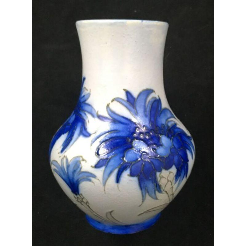 William Moorcroft Vase in the Cornflower design Circa 1920s

Dimensions: 12cm high

Complimentary Insured Postage
14 Day Money Back Guarantee
BADA Member – Buy the Best from the Best