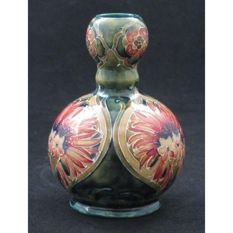 William Moorcroft vase in the Revived Cornflower design for MacIntyres Circa 1912

Dimensions: 11.5cm high

Complimentary Insured Postage
14 Day Money Back Guarantee
BADA Member – Buy the Best from the Best.