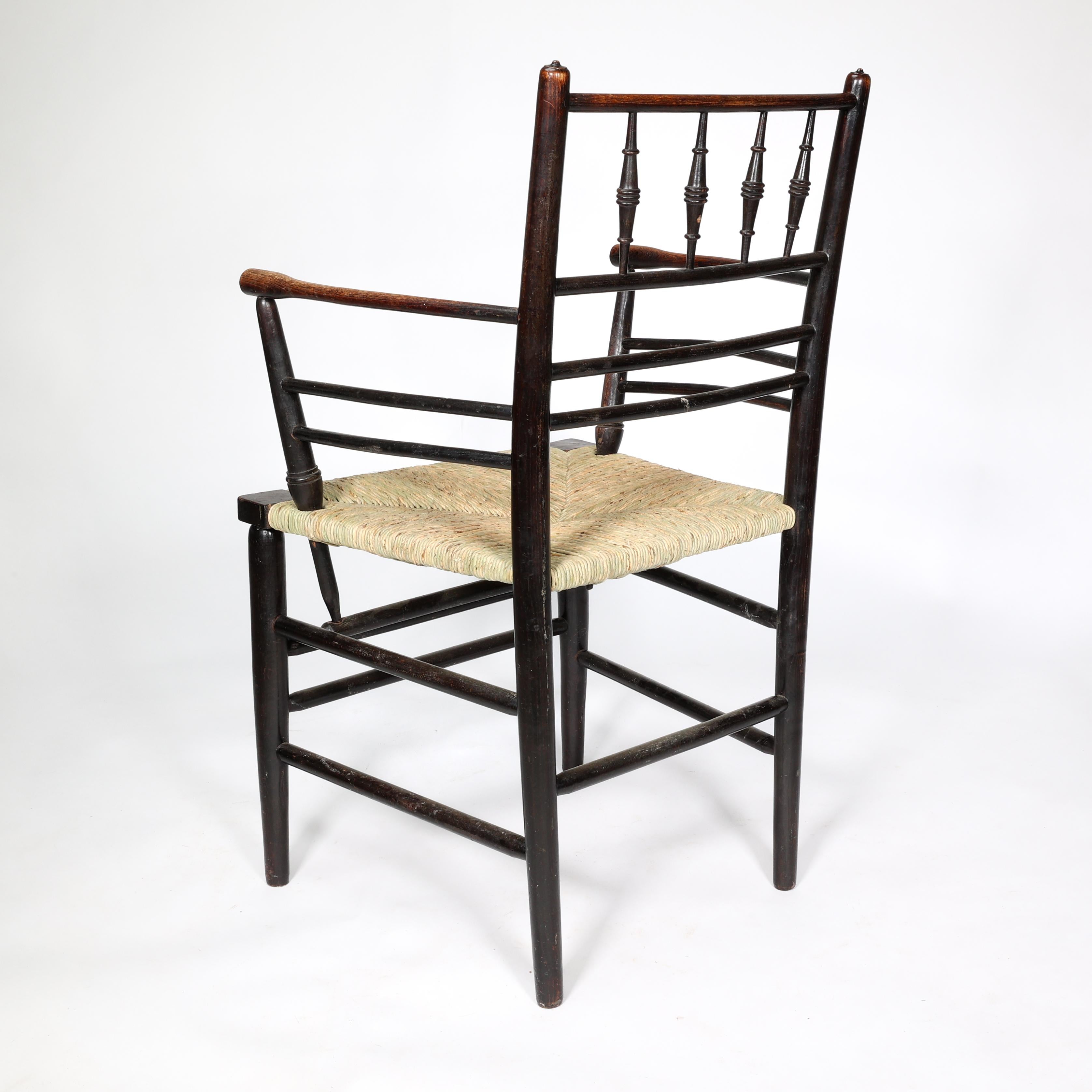 William Morris, A Classic Arts & Crafts Ebonised Armchair from the Sussex Range. 6