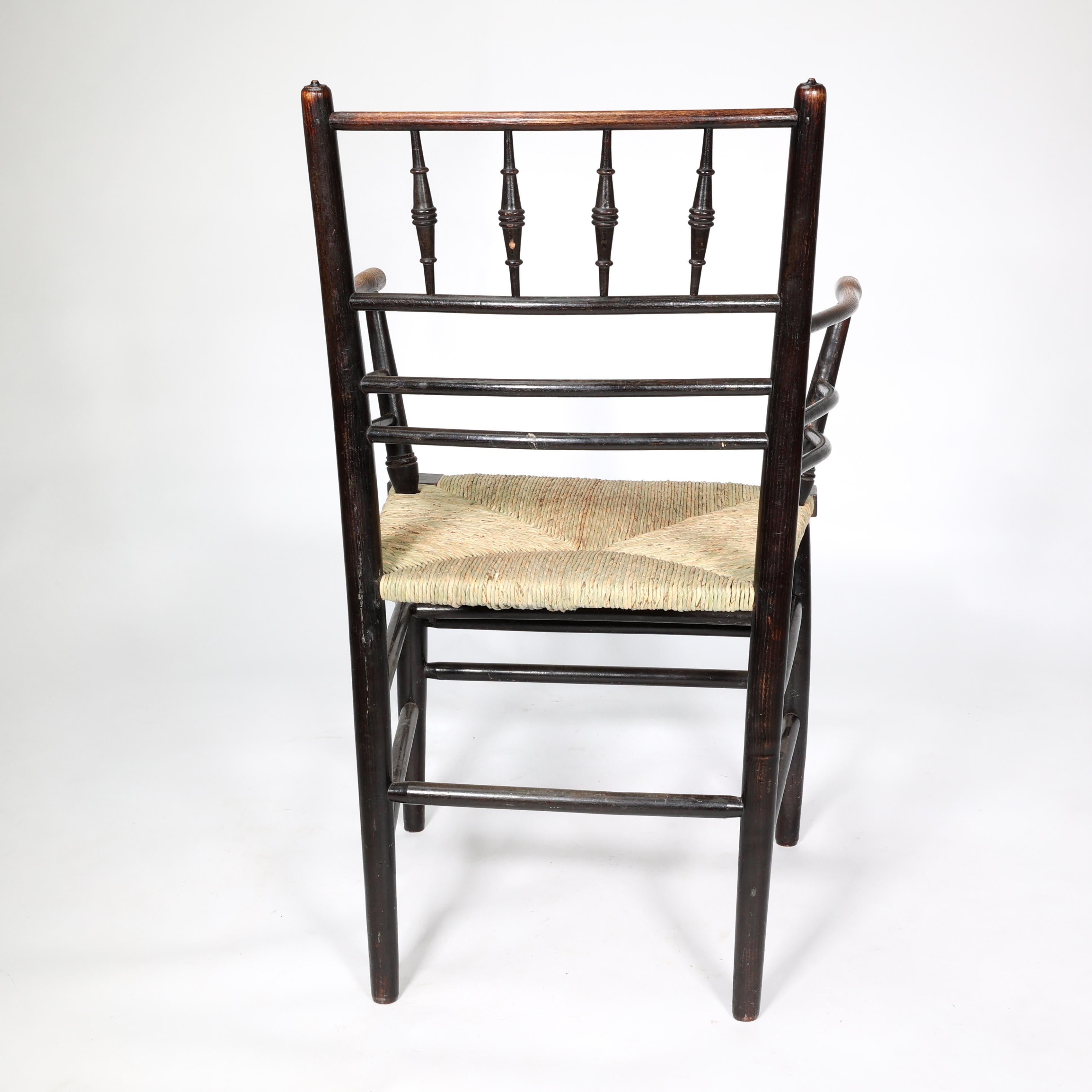 William Morris, A Classic Arts & Crafts Ebonised Armchair from the Sussex Range. 7