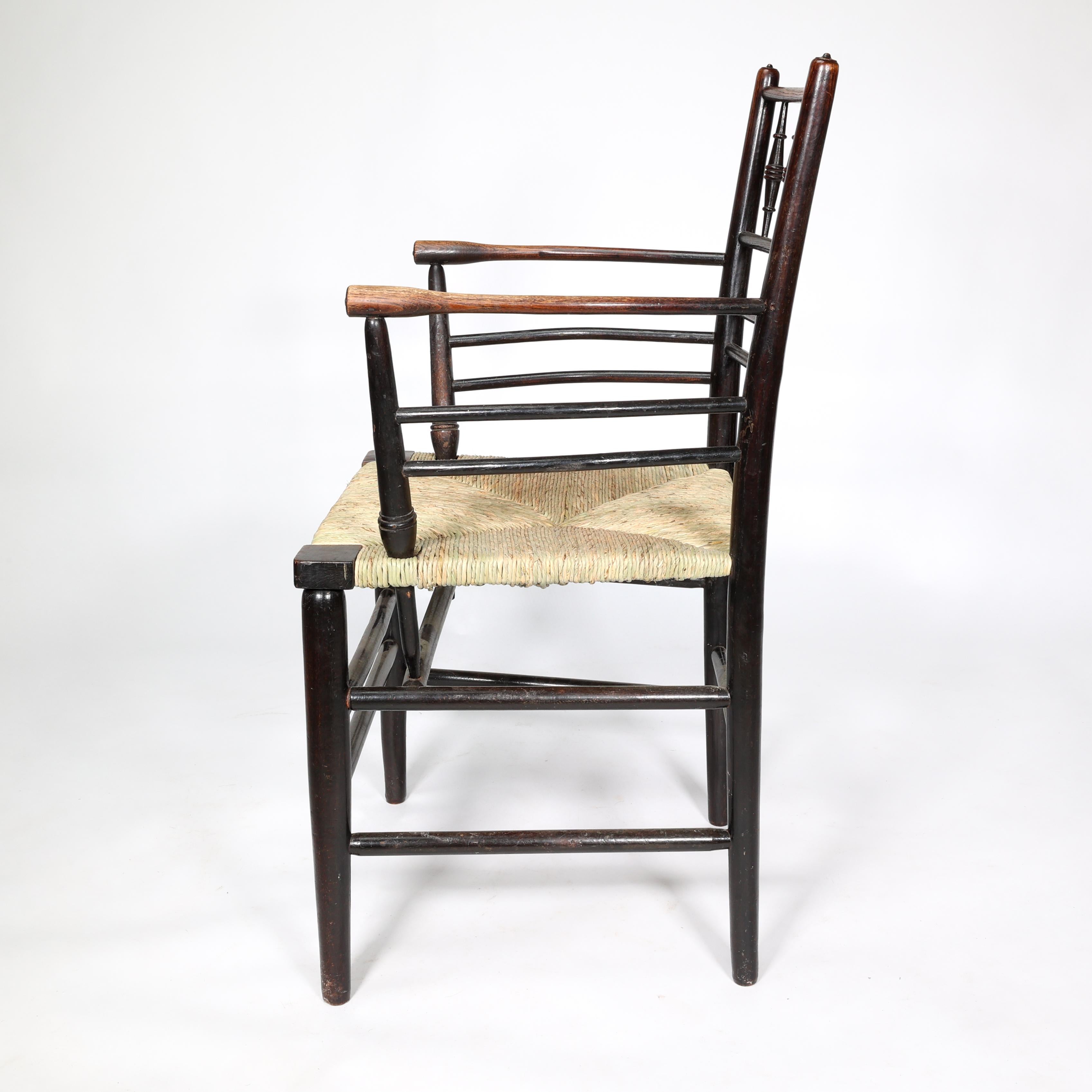 William Morris, A Classic Arts & Crafts Ebonised Armchair from the Sussex Range. In Good Condition In London, GB
