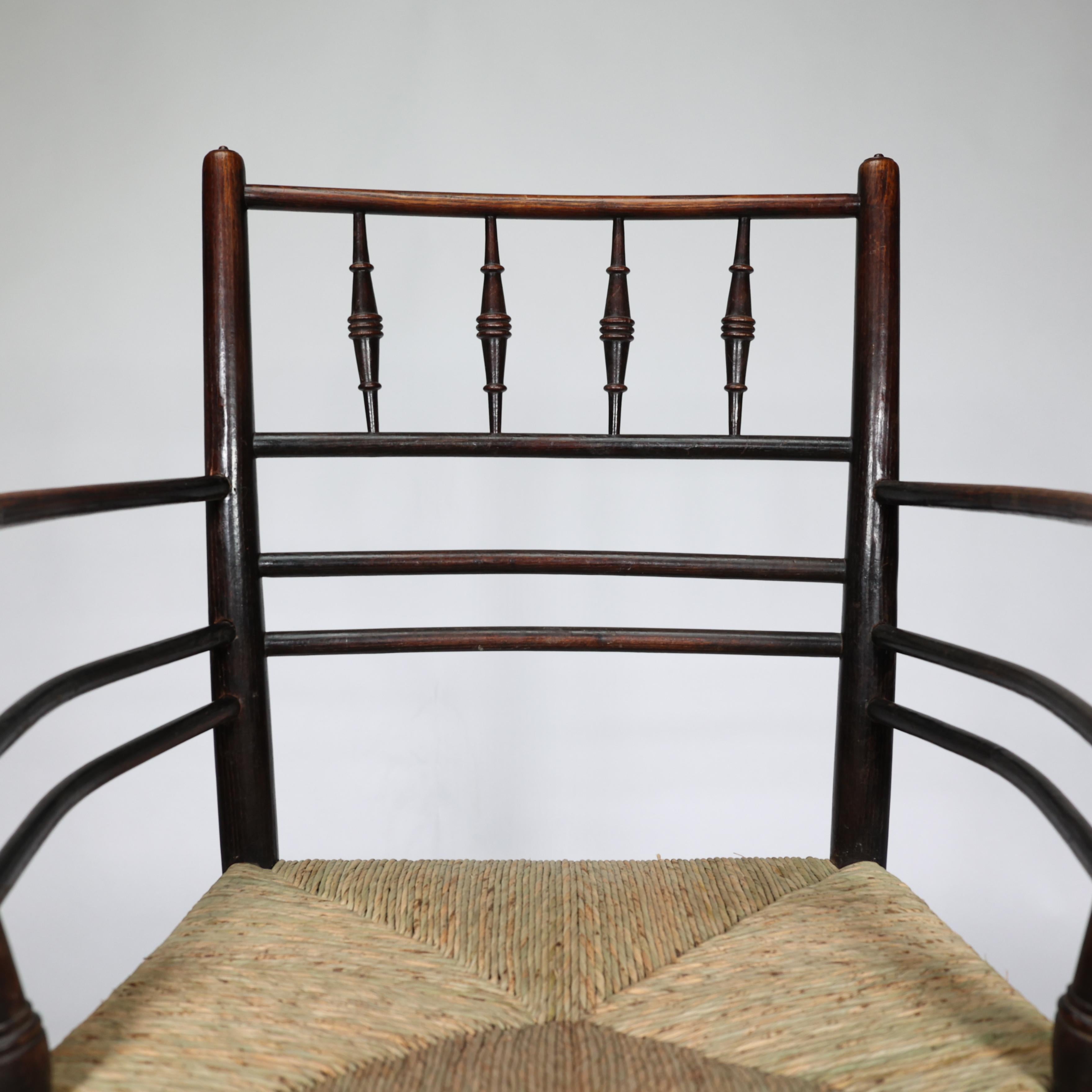 19th Century William Morris, A Classic Arts & Crafts Ebonised Armchair from the Sussex Range.
