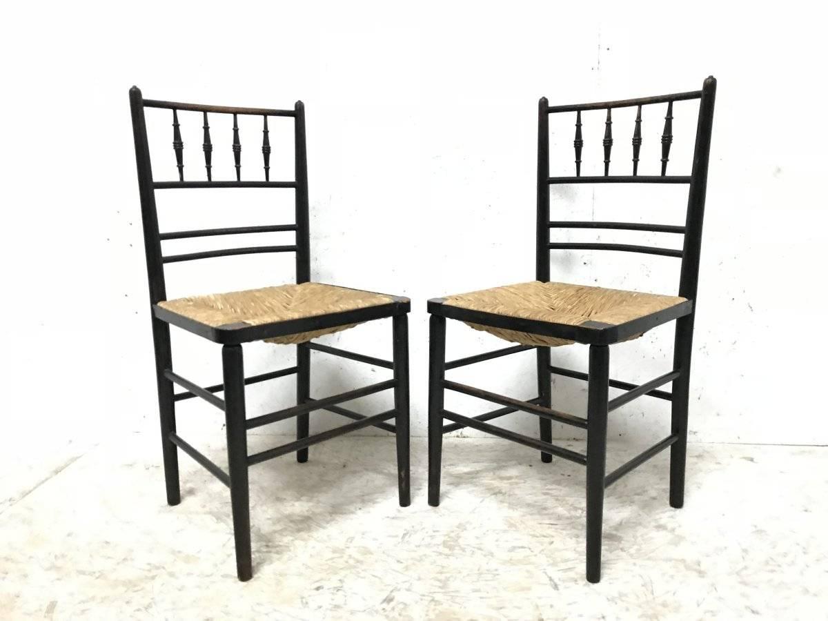 William Morris, Five Ebonized Rush Seat Sussex Side Chairs and Matching Armchair 1