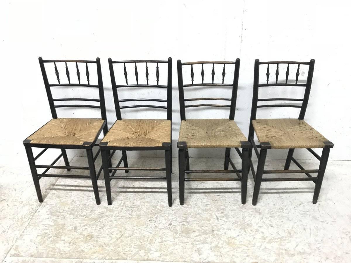 William Morris, Five Ebonized Rush Seat Sussex Side Chairs and Matching Armchair 6