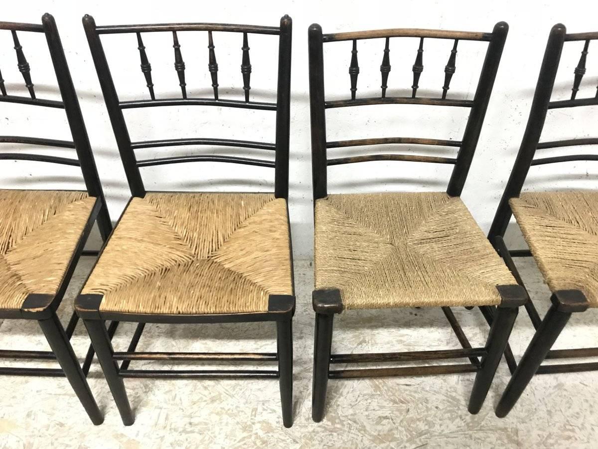 William Morris, Five Ebonized Rush Seat Sussex Side Chairs and Matching Armchair 8