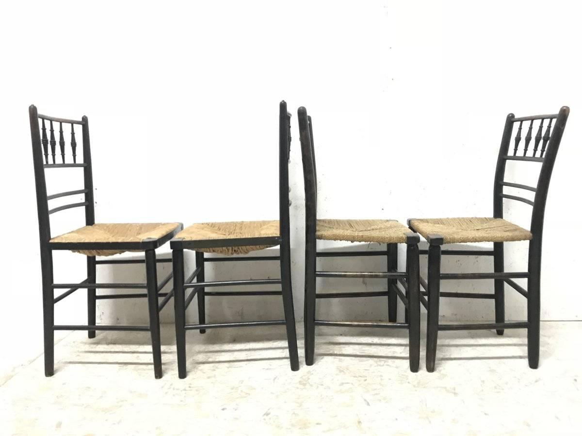 William Morris, Five Ebonized Rush Seat Sussex Side Chairs and Matching Armchair 9