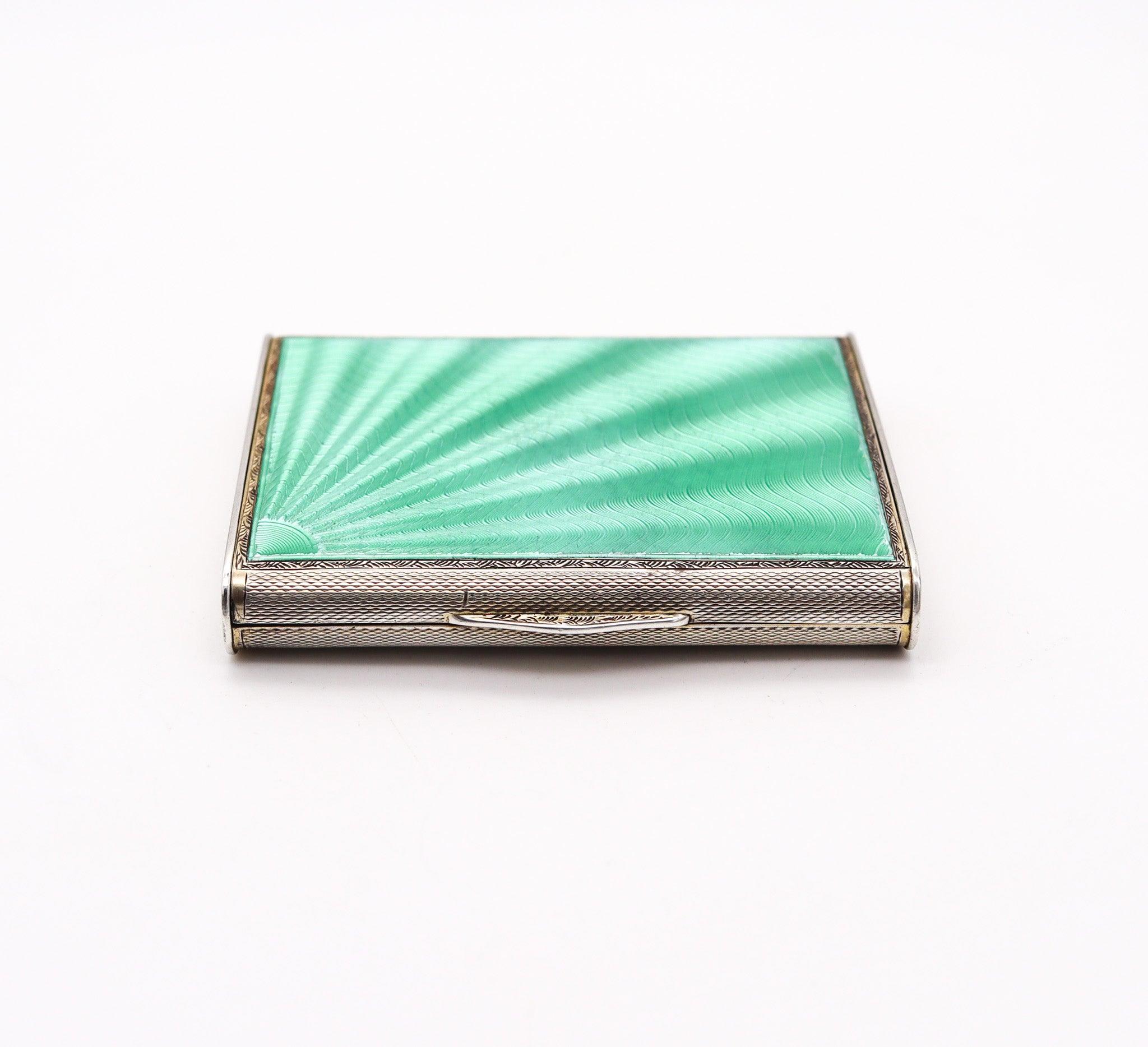 An art deco guilloche enamel box designed by William Neal & Sons

This is a fabulous rectangular antique case-box, created in the city of Birmingham England at the silversmiths of Adie Brothers Ltd, back in the 1931. The beautiful box has been