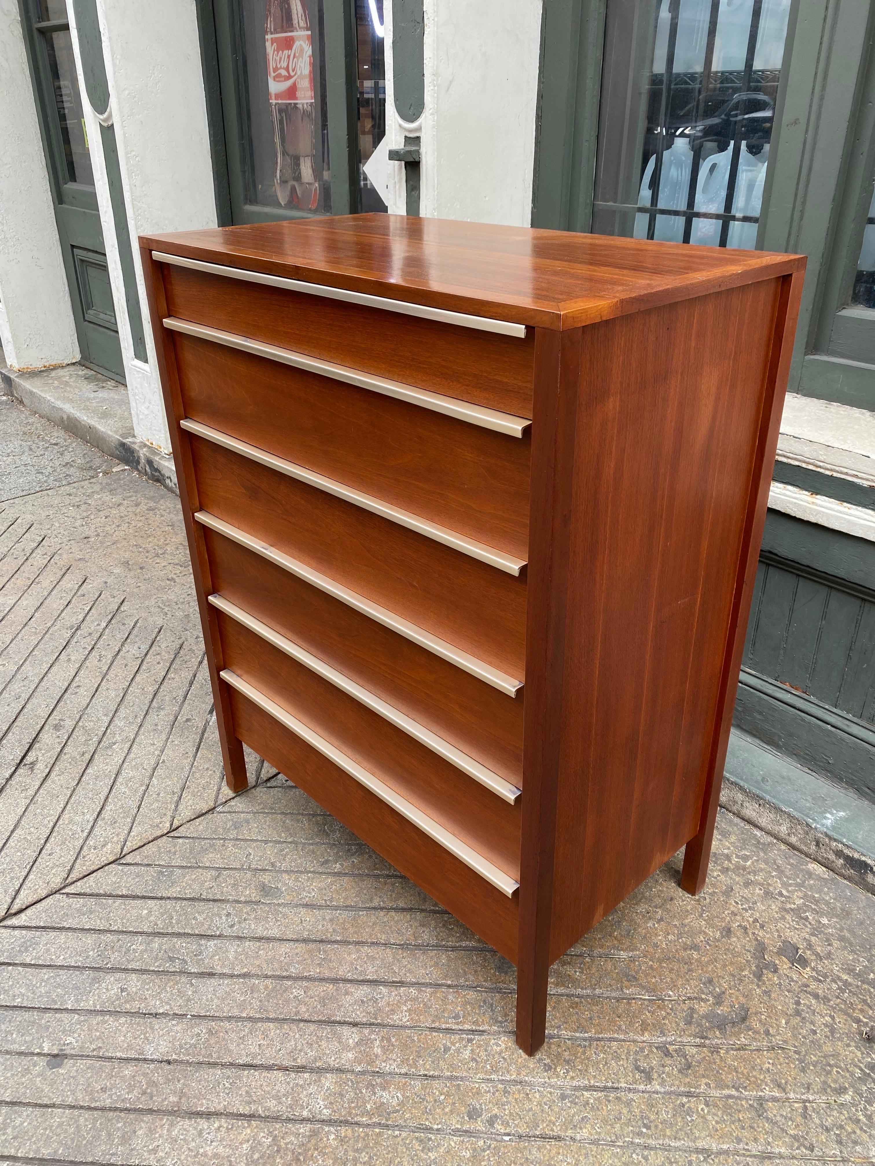 William Pahlmann for Hastings furniture tall dresser. Walnut with Aluminum pulls that run across the top of each drawer. Listed separately 2 matching low dressers and nightstands. Original condition! Aluminum handles show wear at tops. All handles