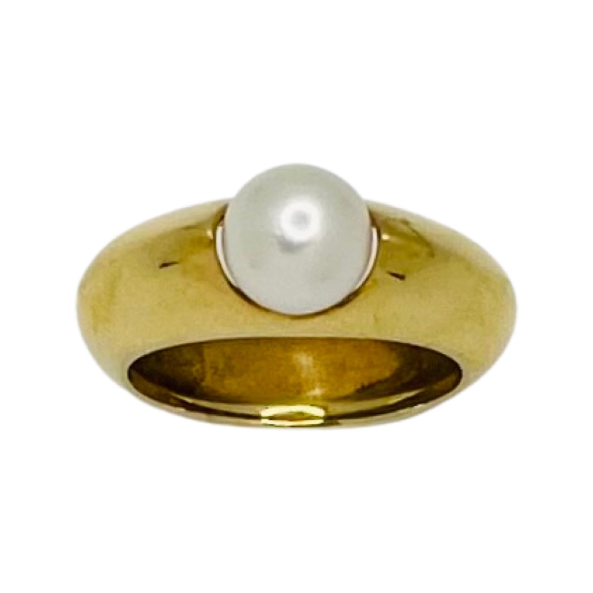 William Richey 18K Yellow Cultured Japanese Akoya Pearl Ring. The Akoya pearl is 7.5 mm.  The natural color pearl is round with very slight blemishes.  It has a high luster and a rose overtone. The shank is 7.6 mm at the top and tapers to 7.0 mm at