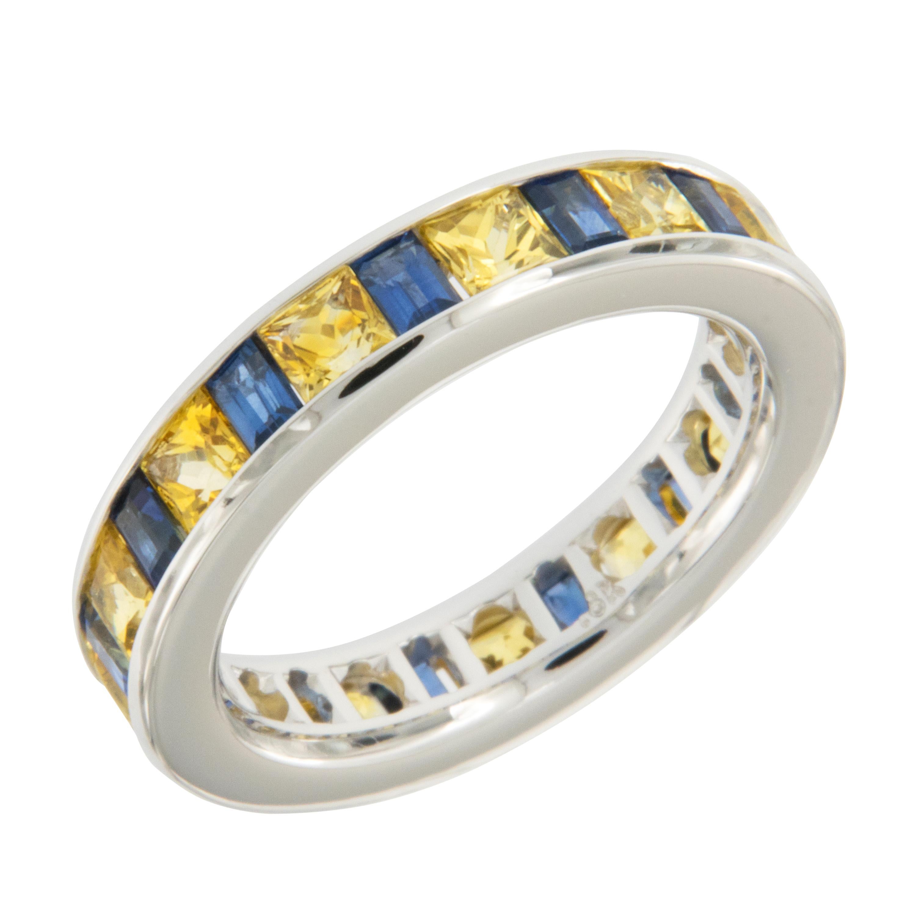 Hail to the victors! Whether you are a U of M Wolverine student, graduate, alumni, fan or just love the complimentary colors of blue & maize this ring is for you! Expertly hand fabricated ring in fine 18 karat white gold with perfectly channel set