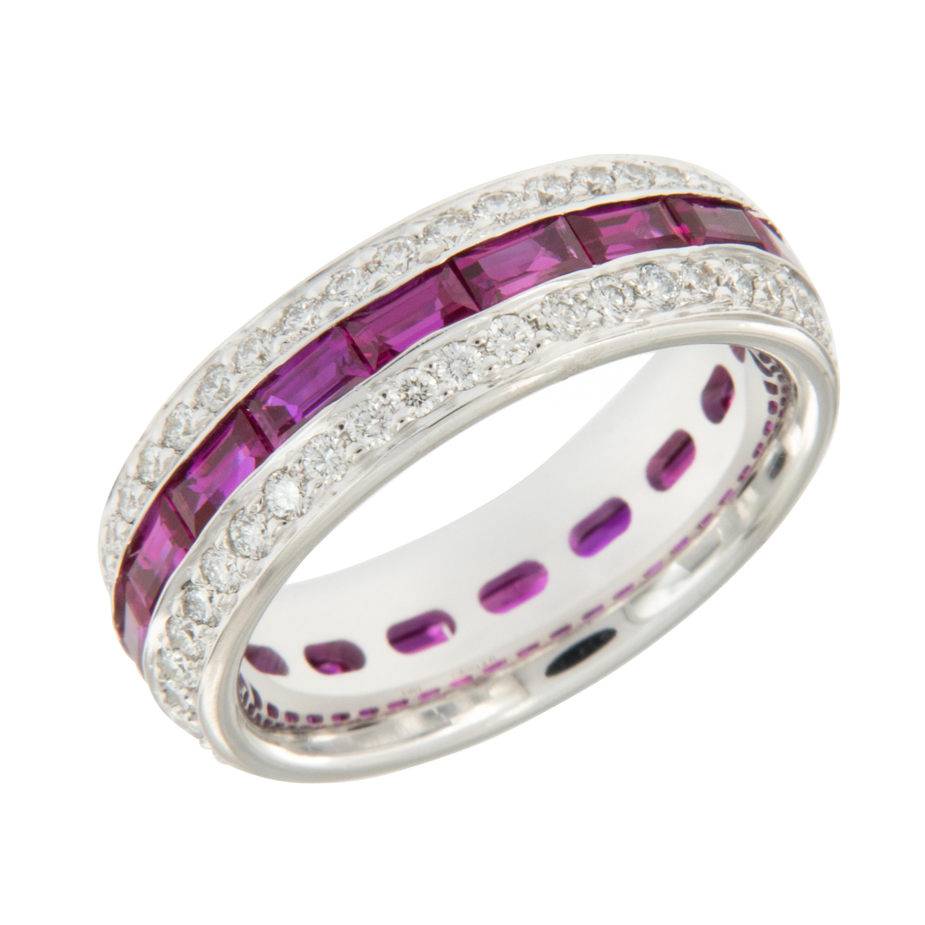 Expertly hand fabricated eternity band by William Rosenberg made from fine 18 karat white gold with horizontally placed, perfectly channel set rubies set off & edged by pave' set diamonds . This ring was made in a size 6.25 but can be custom made in