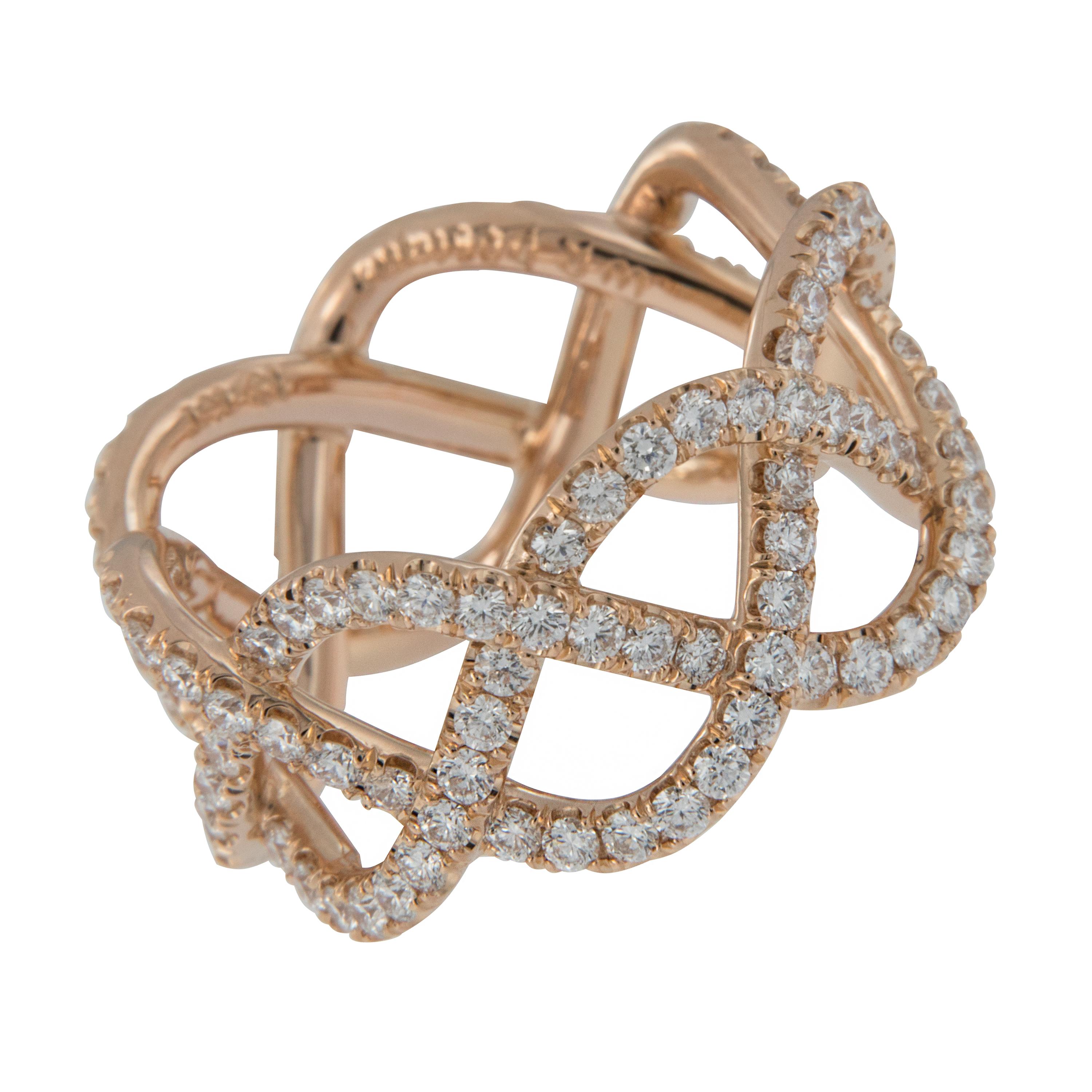 The rare soft color of this 20 karat rose gold diamond ring, hand made by William Rosenberg is breathtaking! The delicate open weave design is accented by 1.35 Cttw round brilliant cut diamonds of VVS clarity & E-F color to top off the