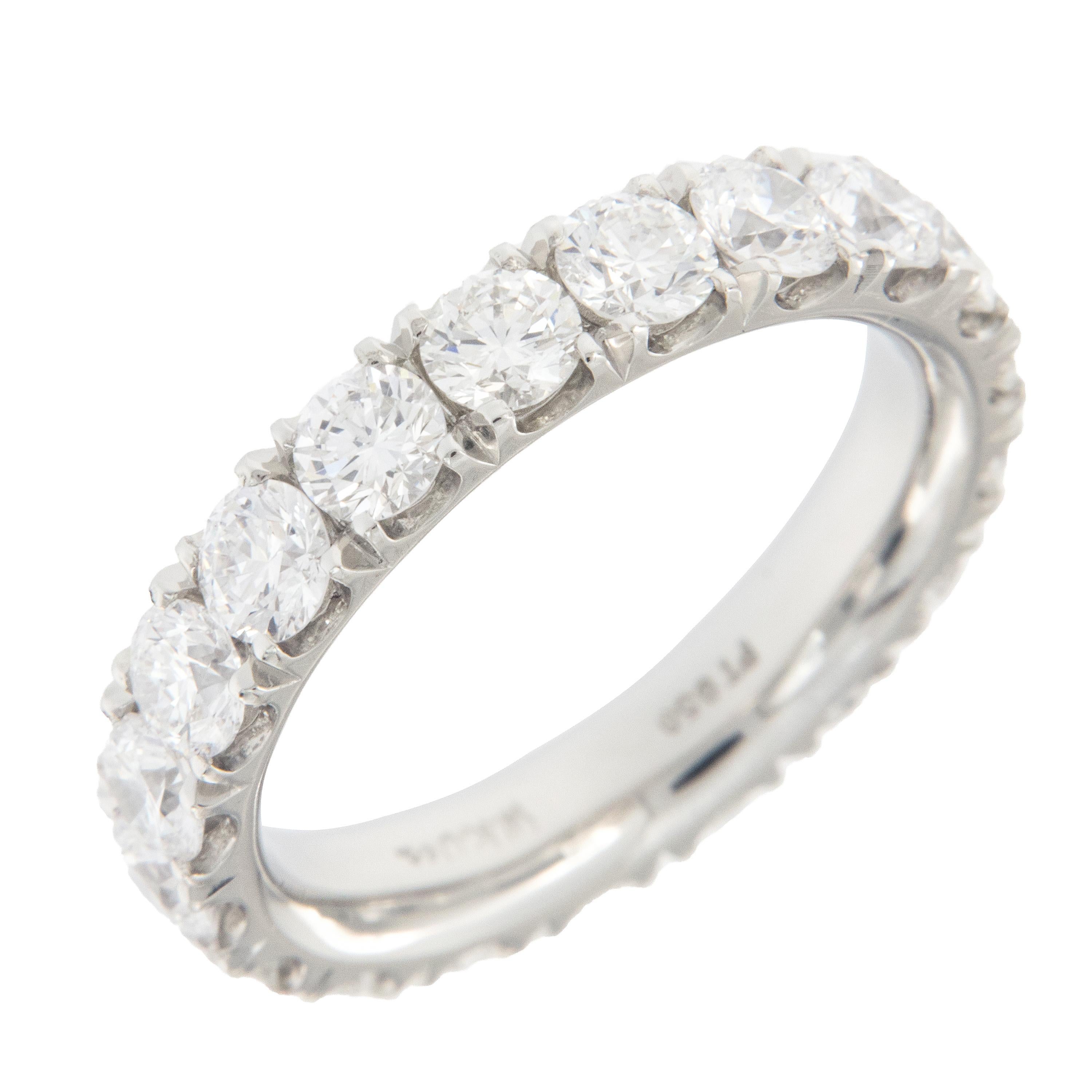 Expertly hand fabricated eternity band by William Rosenberg made from noble metal platinum with scalloped, split prong set round brilliant diamonds = 2.78 Cttw. These exceptional diamonds show hearts & arrows and are of VVS clarity & D-F color. This