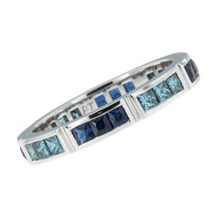 William Rosenberg Platinum Sapphire and Blue Diamond Ring
