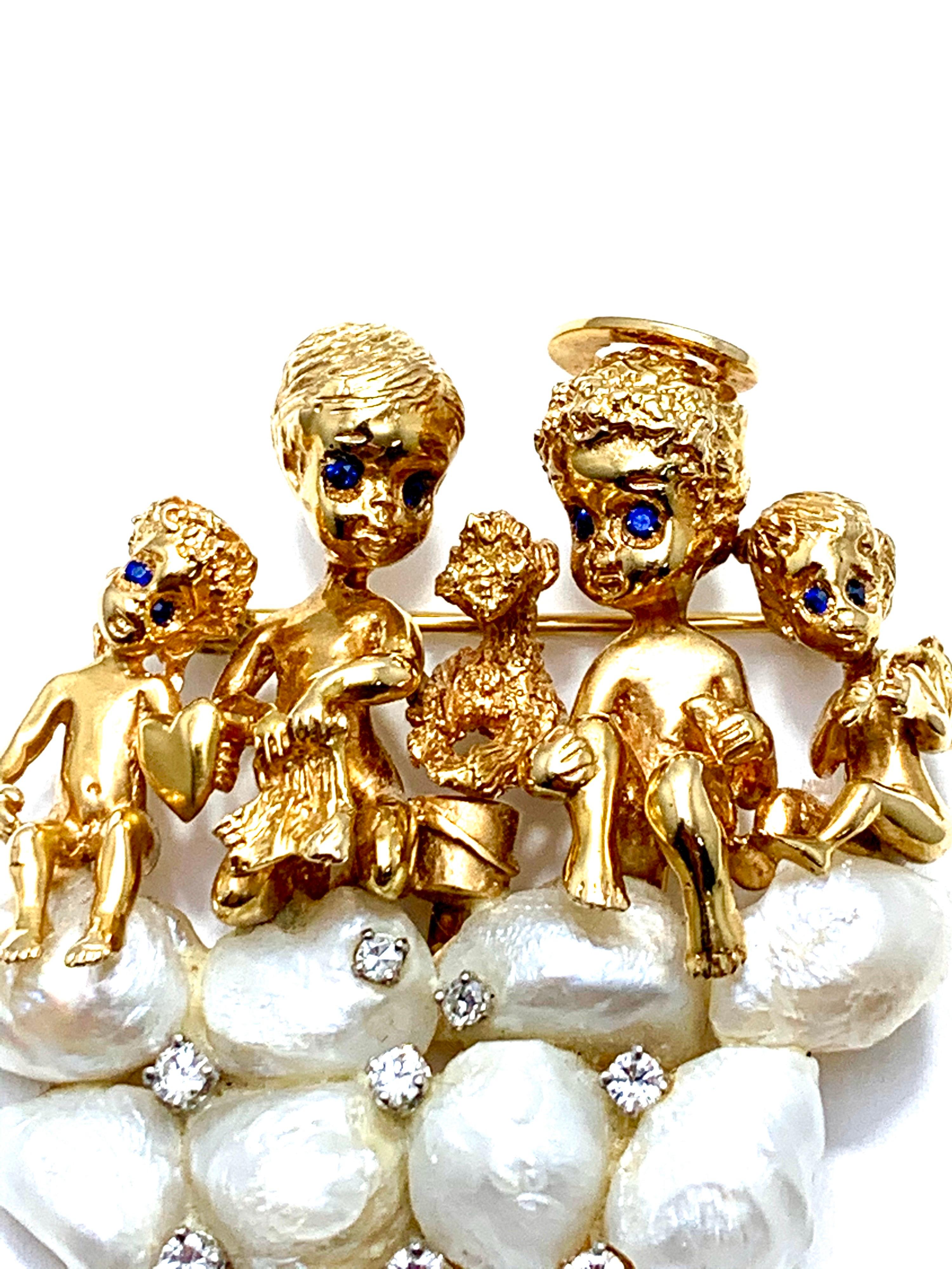 An iconic design by William Ruser.  Three children sitting with a dog and an angel on top of a wall made from Pearls and round brilliant Diamonds.  The eight Diamonds have a total carat weight of 0.26.  The brooch features a single pin back, with a