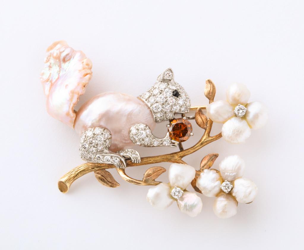 The Californian jeweler, William Ruser, was known as the jeweler to the stars from the late 1940s through the 1960s.  In addition to his elegant diamond pieces, Ruser became famous for his whimsical jewels utilizing American freshwater pearls. 