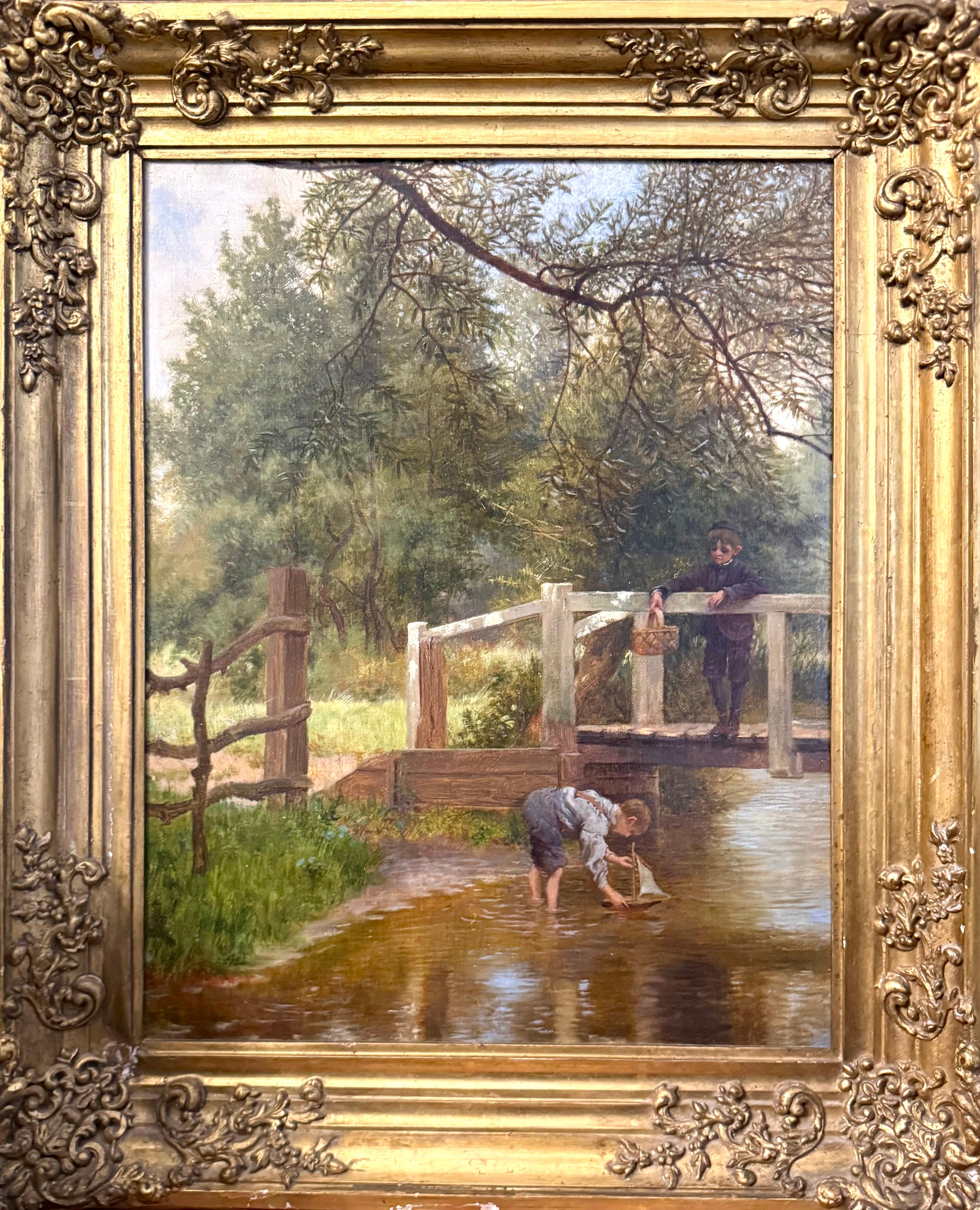 Ragazzo che naviga con una barca giocattolo nel torrente, olio su tela in cornice dorata firmato e datato 1897