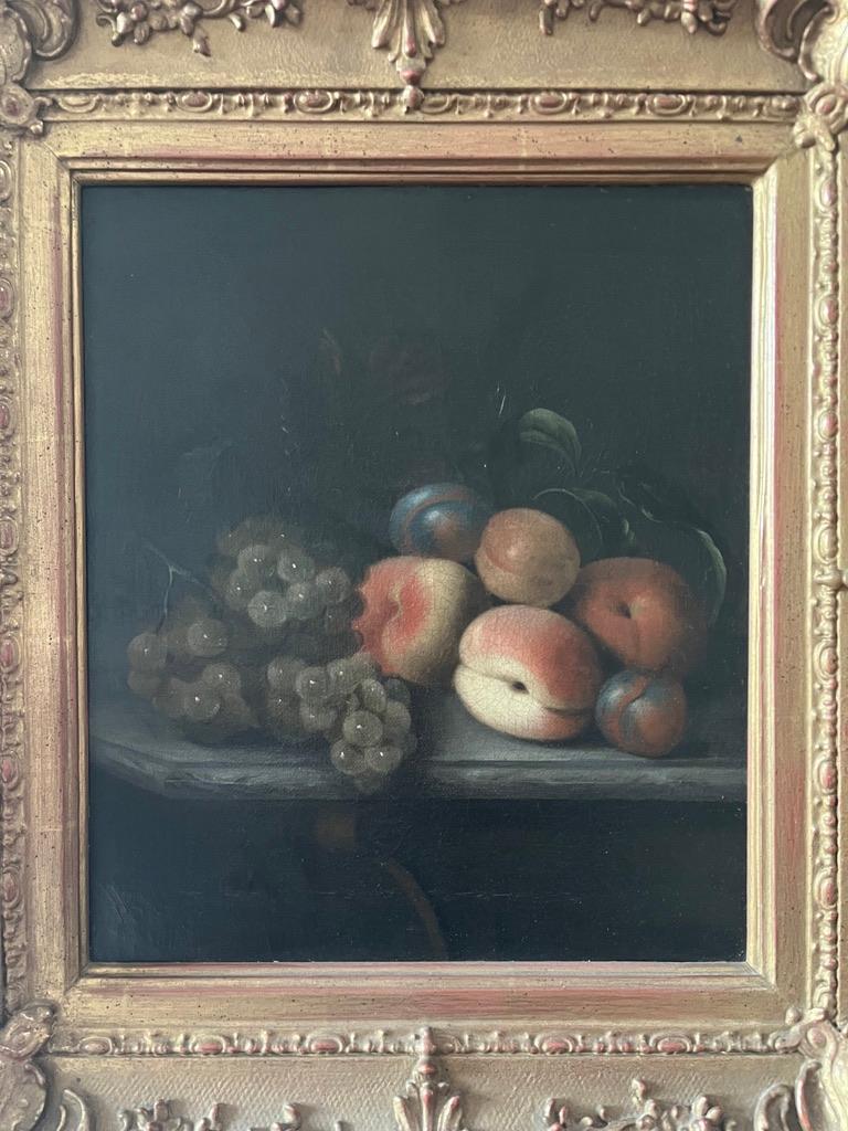 A rare and most attractive still life by William Smith of Chichester. The sumptuous textures of the peaches and grapes contrasting with the dark background. A really handsome 18th Century piece that would add grace and elegance to any dining room,